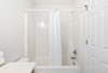 Apartment 102: Master Bedroom Bath - Tub and Shower