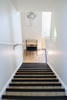 Apartment 104: Stairway From Bedrooms to Lower Level